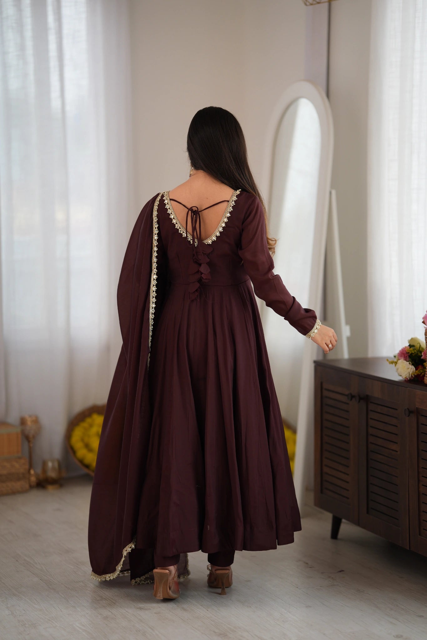Back view of Dark Brown Anarkali suit with open dori tie-up back